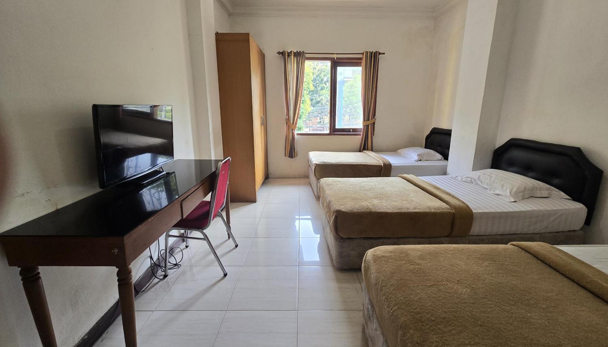 Hotel Maxim Kwitang Jacarta Quarto foto