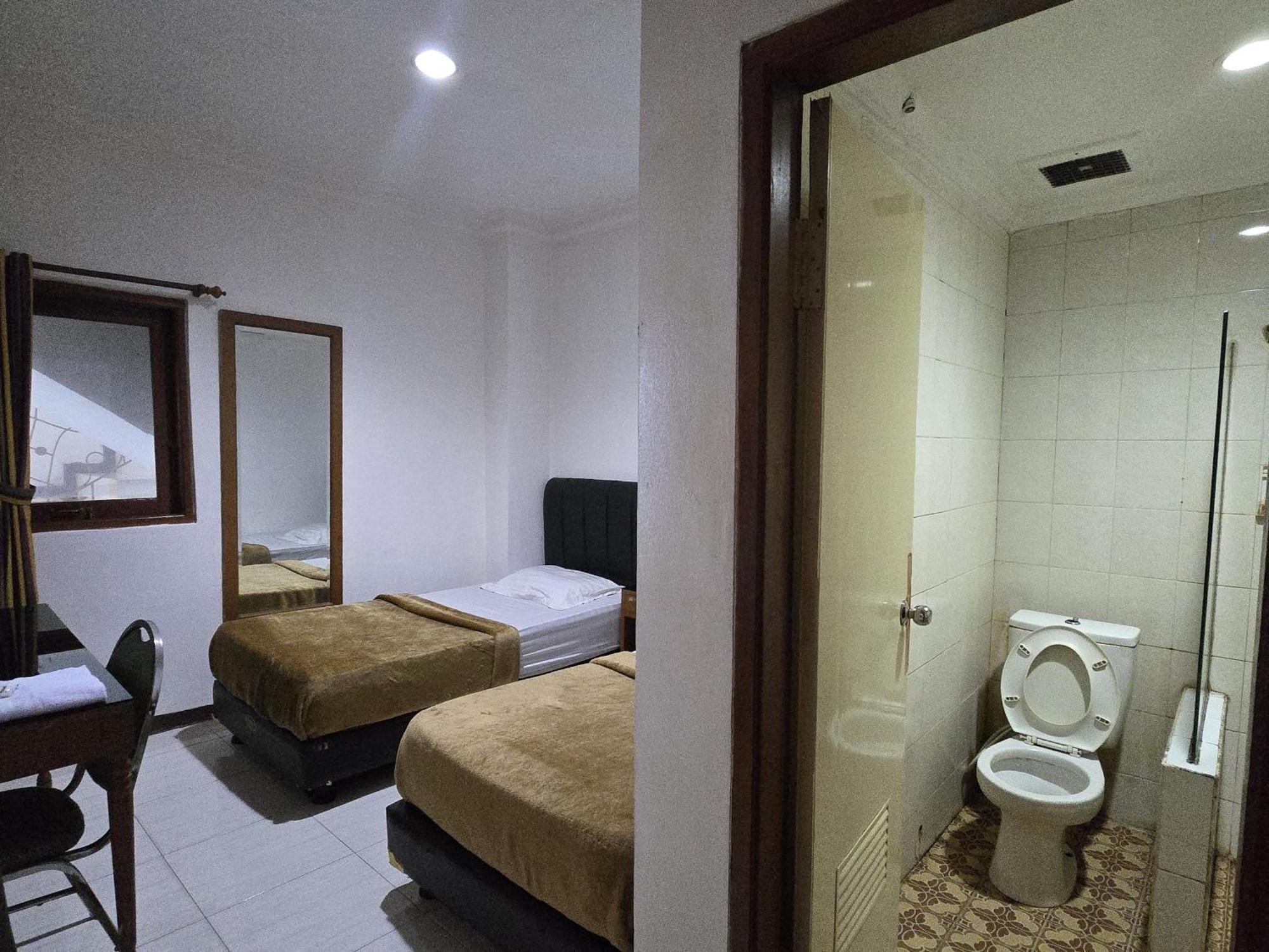 Hotel Maxim Kwitang Jacarta Quarto foto