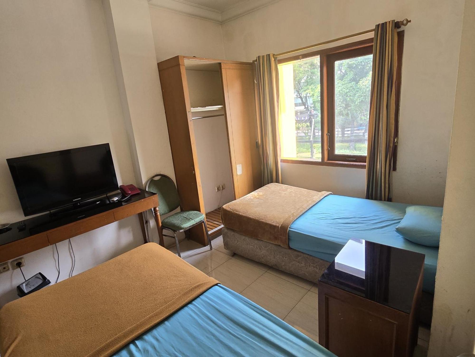 Hotel Maxim Kwitang Jacarta Quarto foto