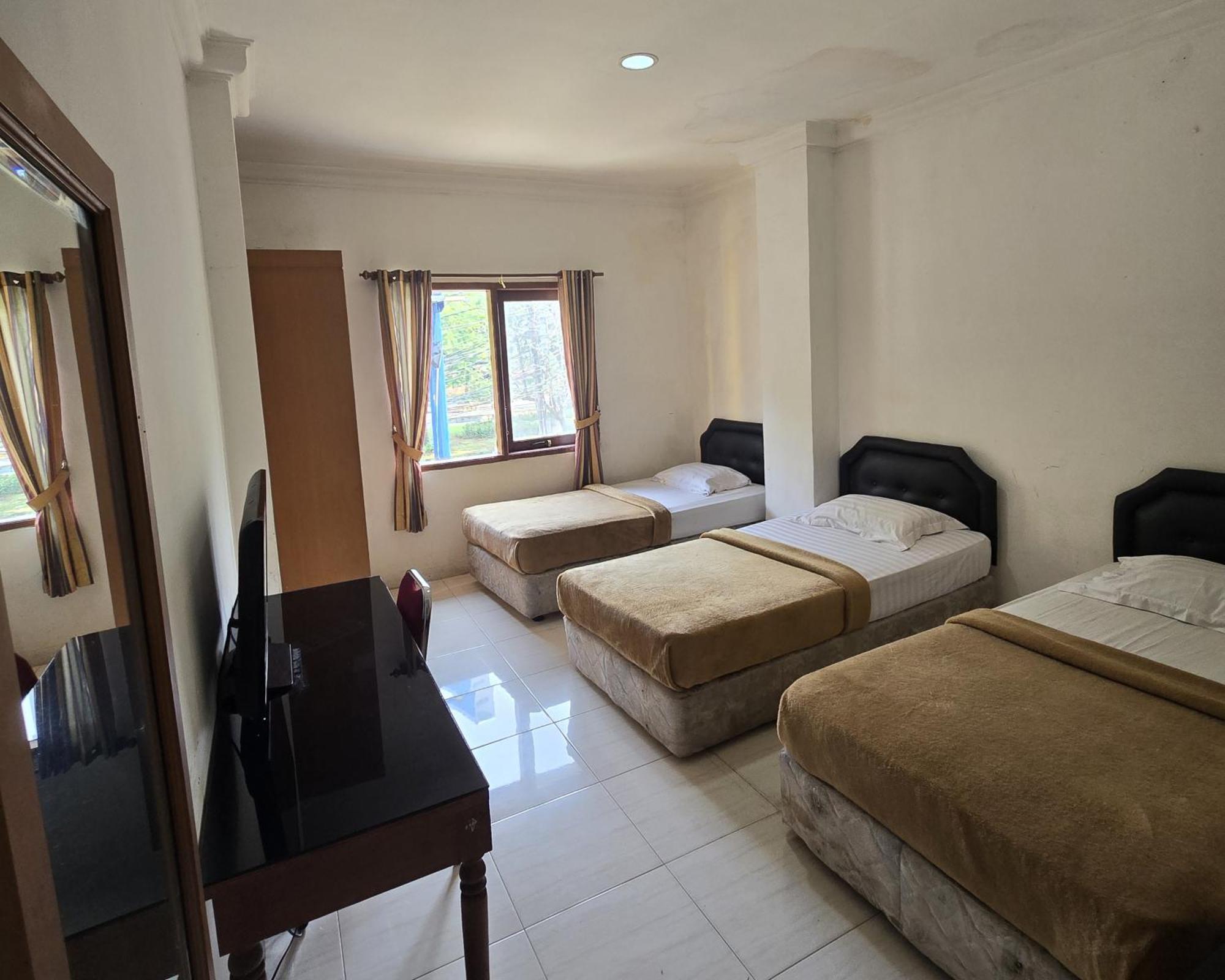 Hotel Maxim Kwitang Jacarta Quarto foto