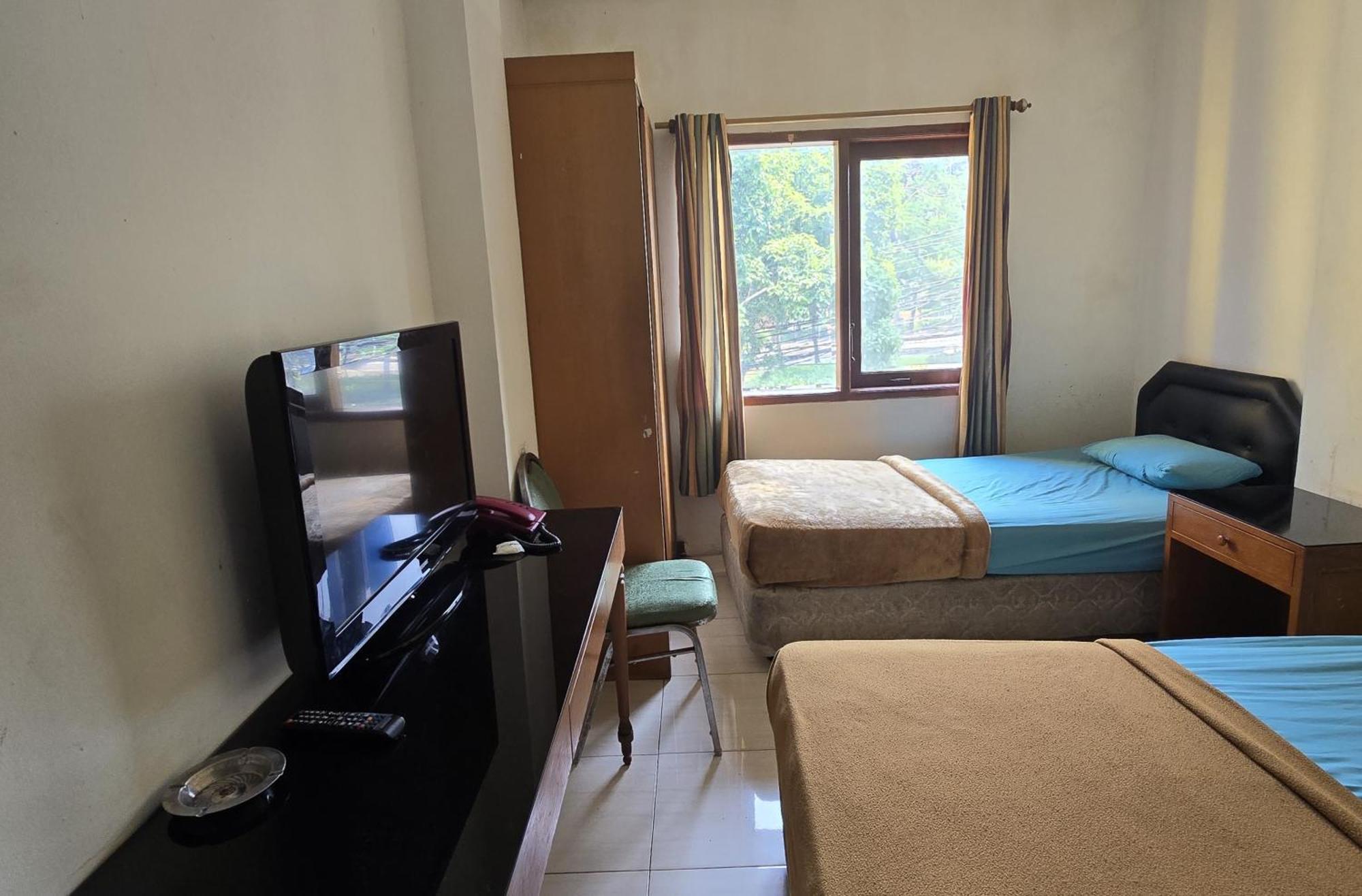 Hotel Maxim Kwitang Jacarta Quarto foto